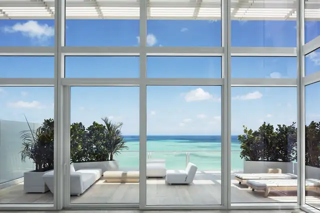 Four Seasons Surf Club in Surfside, modern interior with large windows