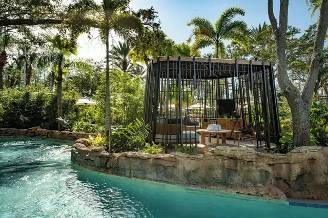 Ritz-Carlton Orlando, Grande Lakes in Orlando, pool with a wooden gazebo and lounge chairs