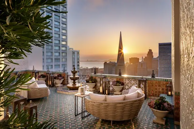 Fairmont San Francisco, rooftop terrace with a fountain and city skyline