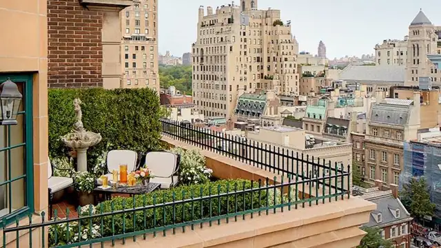 The Lowell in New York, rooftop terrace with a view of city buildings
