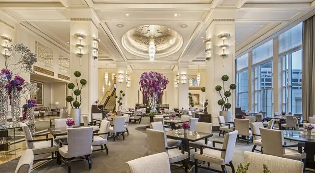 The Peninsula Chicago in Chicago, spacious lobby with seating areas and a staircase