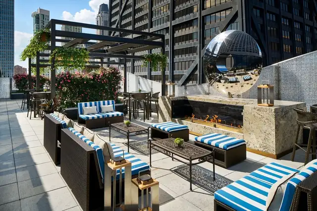 The Ritz-Carlton Chicago in Chicago, high-rise lounge with seating and outdoor fire pit