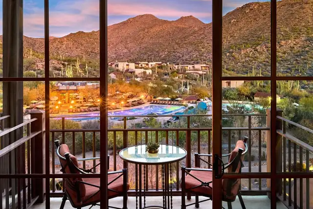 Ritz-Carlton Dove Mountain in Marana, balcony with a glass table and chairs