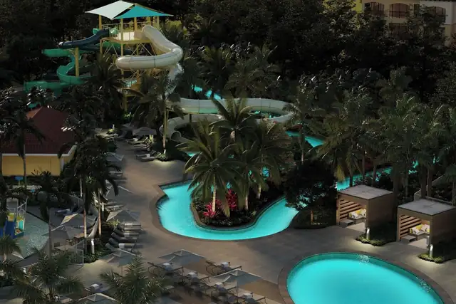 Ritz-Carlton Naples, Tiburón in Naples, pool area with a waterslide and loungers