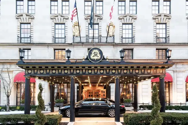 St. Regis Washington in Washington, DC, entrance with canopy, columns and flags