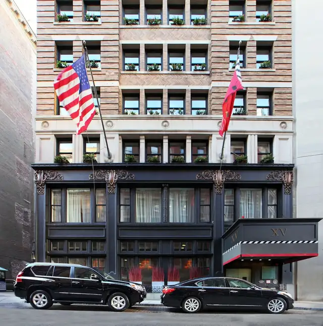 XV Beacon in Boston, classic facade with large windows and a prominent entrance